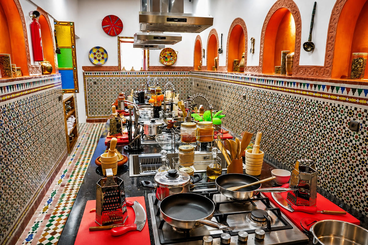 Cooking school kitchen with tiled walls, arched niches and rows of pans on the stoves