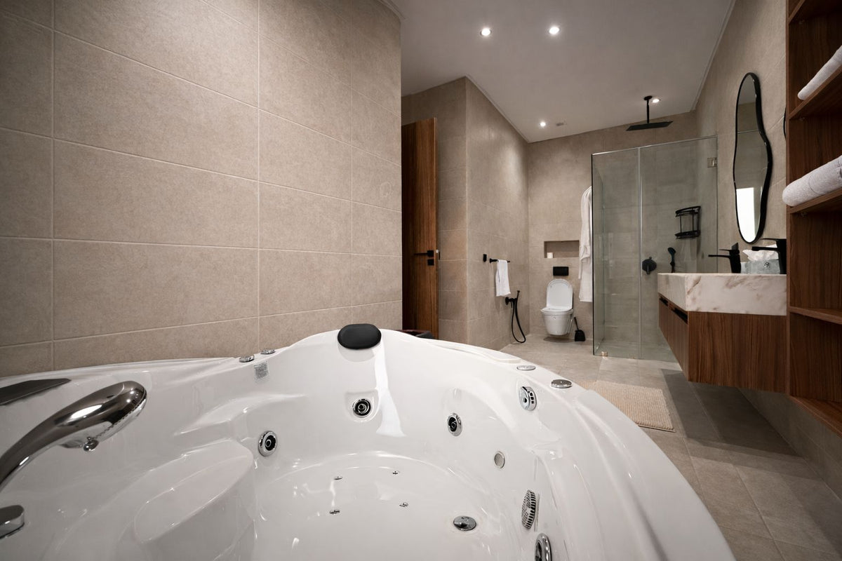 A bathroom with a jacuzzi tub