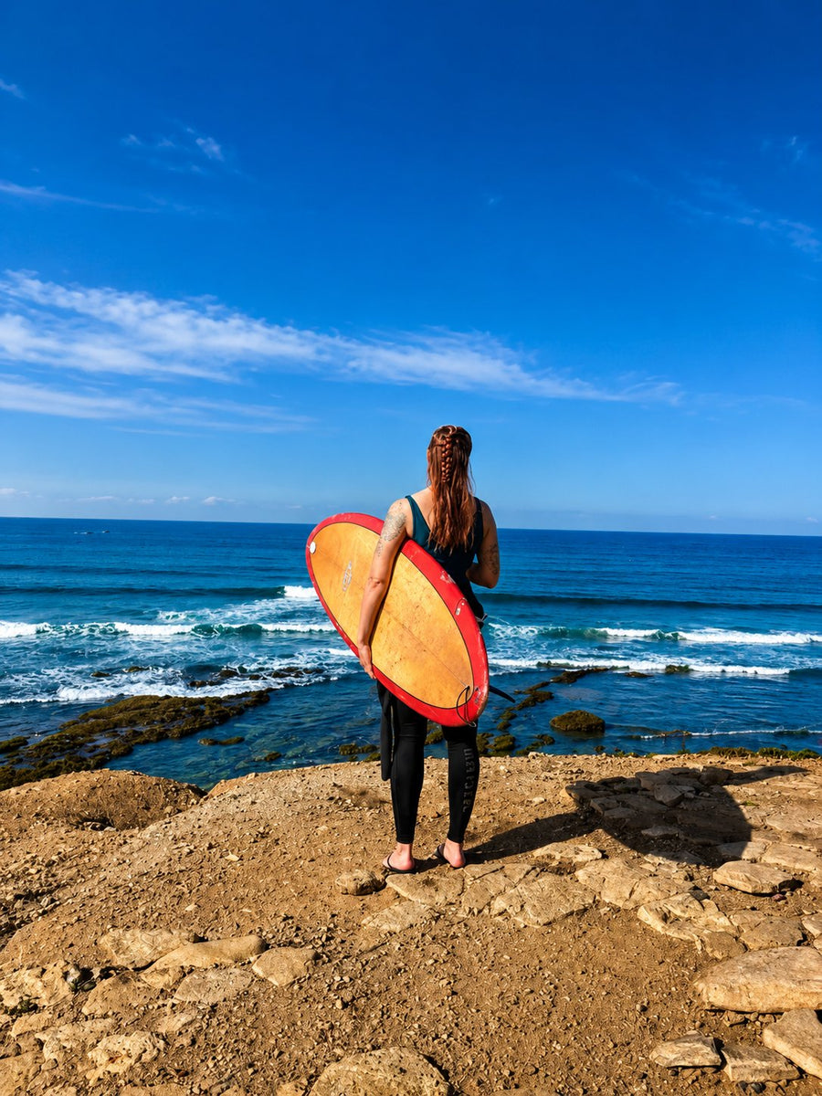Beginner surfers in the morning line-up at Taghazout on Morocco's Atlantic coast.